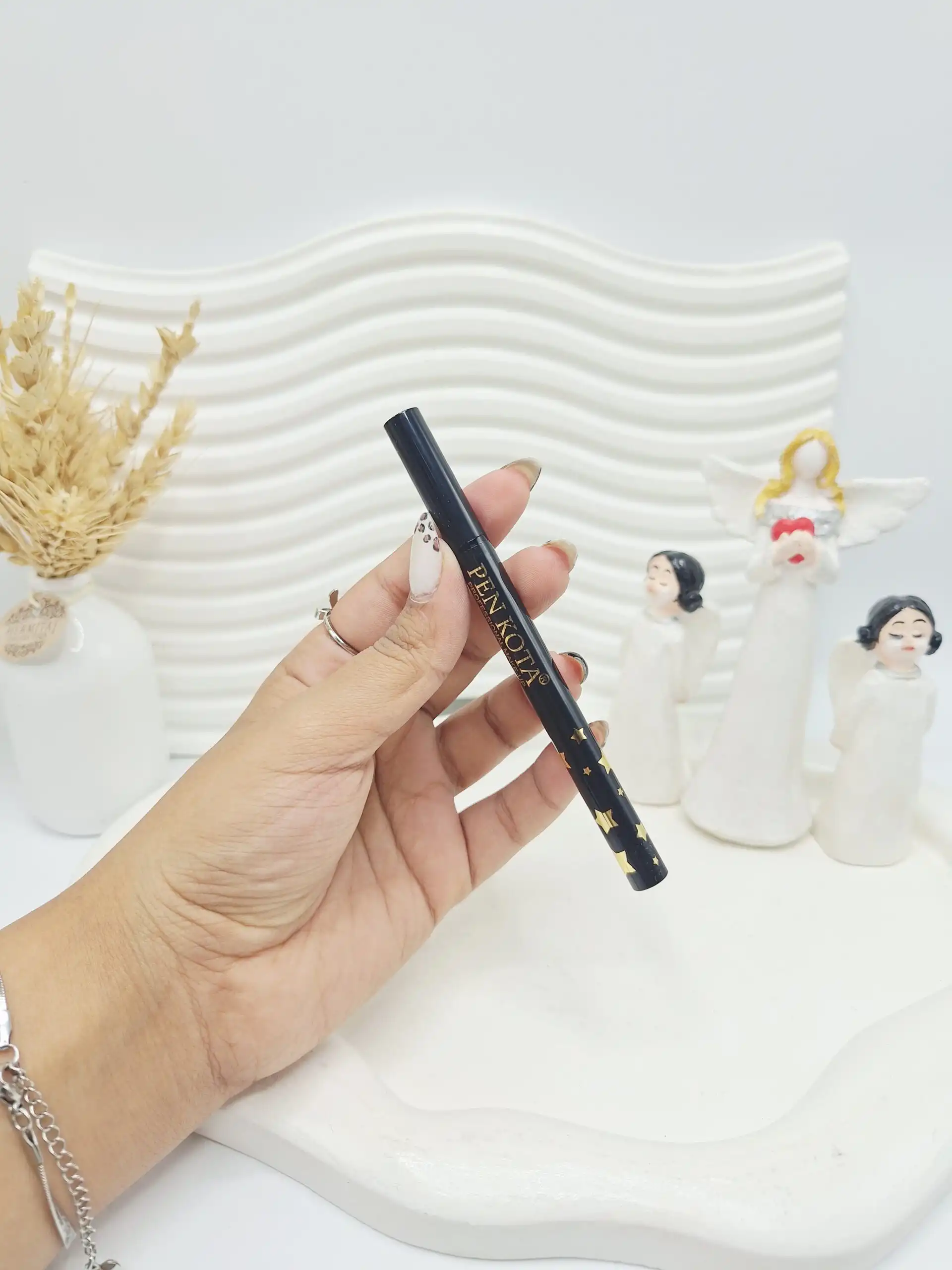 خط چشم شاین دار استامپی برند PEN KOTA کد 9992