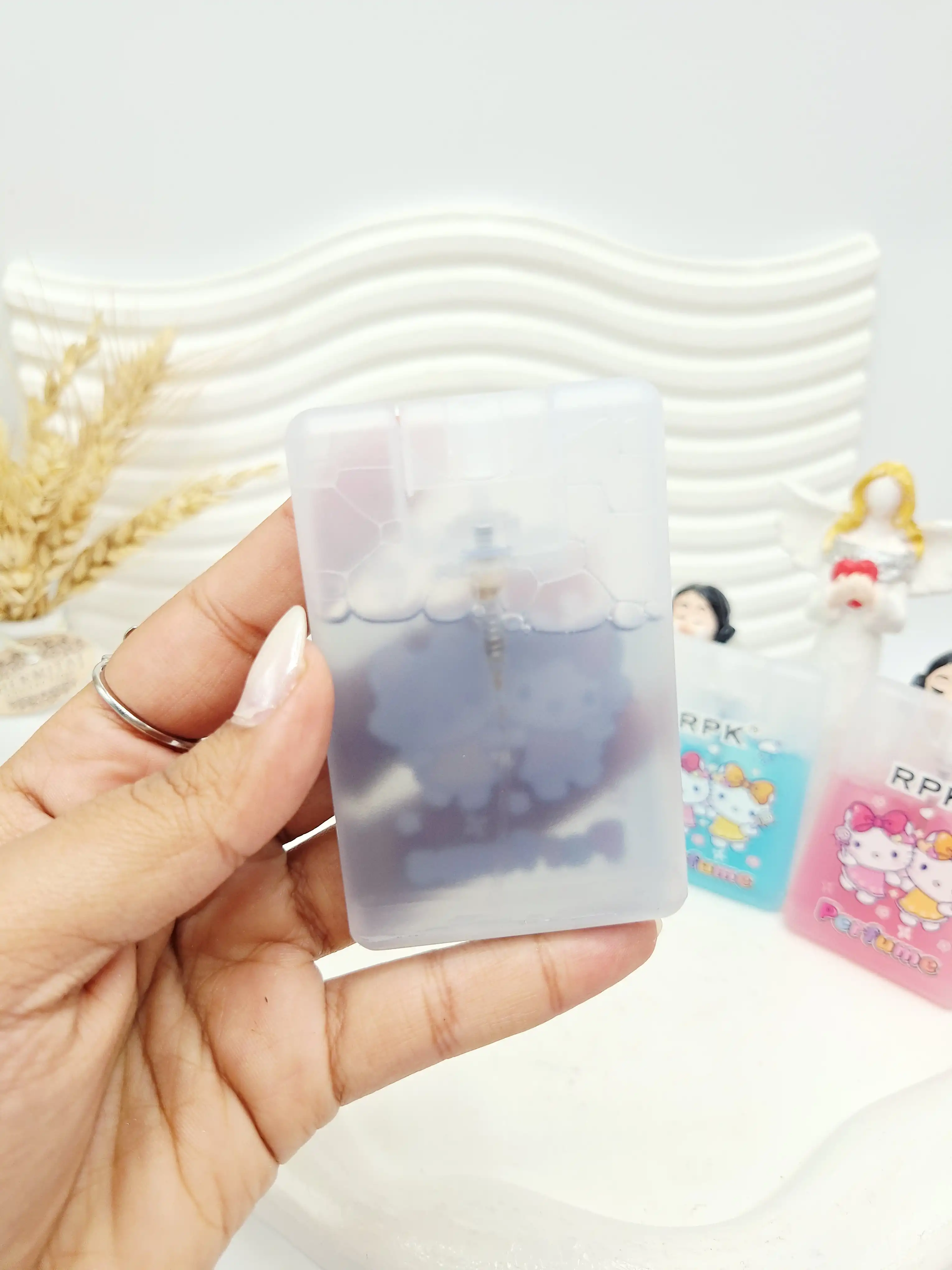 عطر جیبی مسافرتی طرح کیتی حجم 20 میل مناسب کودکان کد 1461