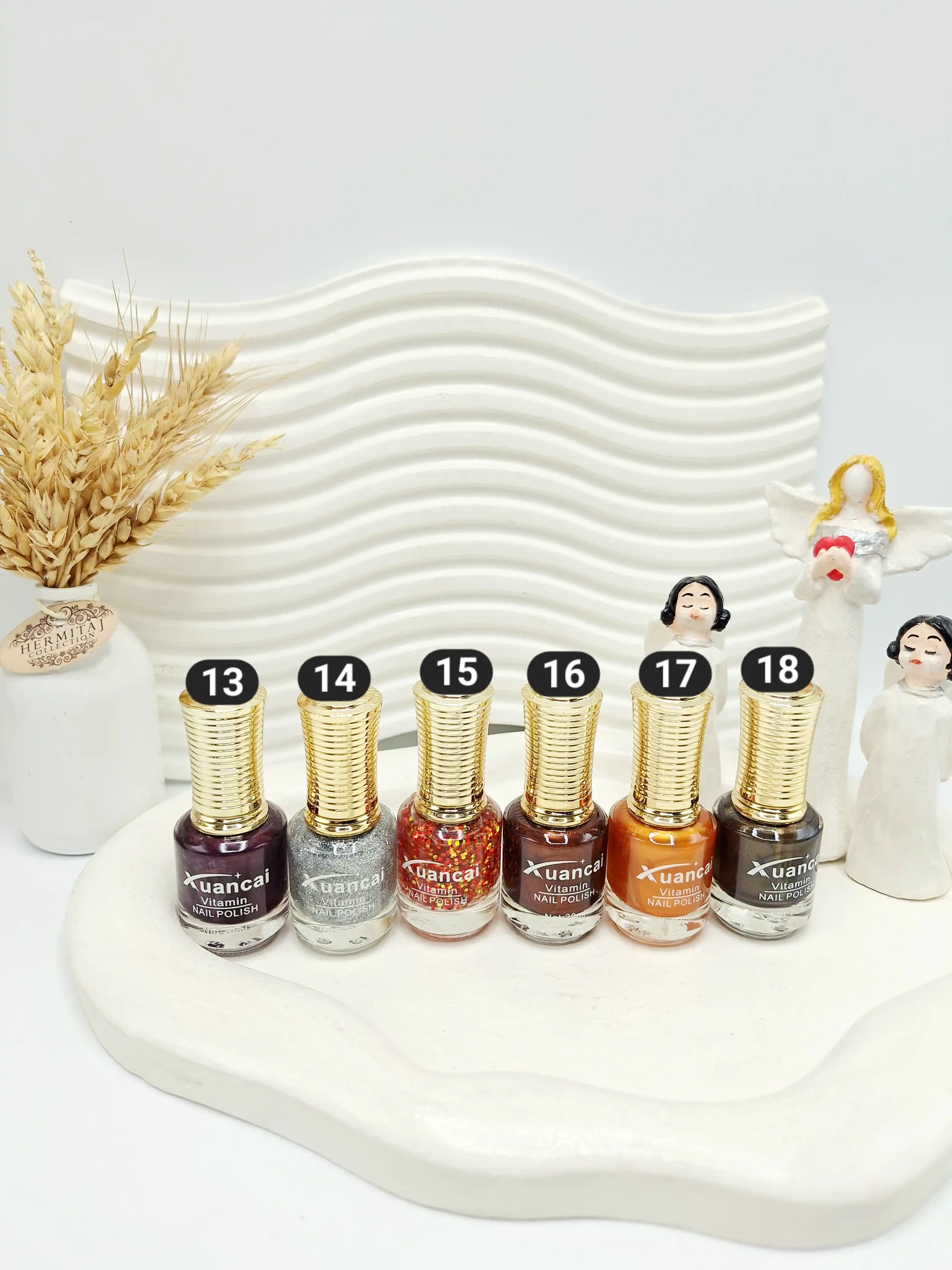 لاک ناخن دایره ای سر طلایی برند Xuancai کد 8055