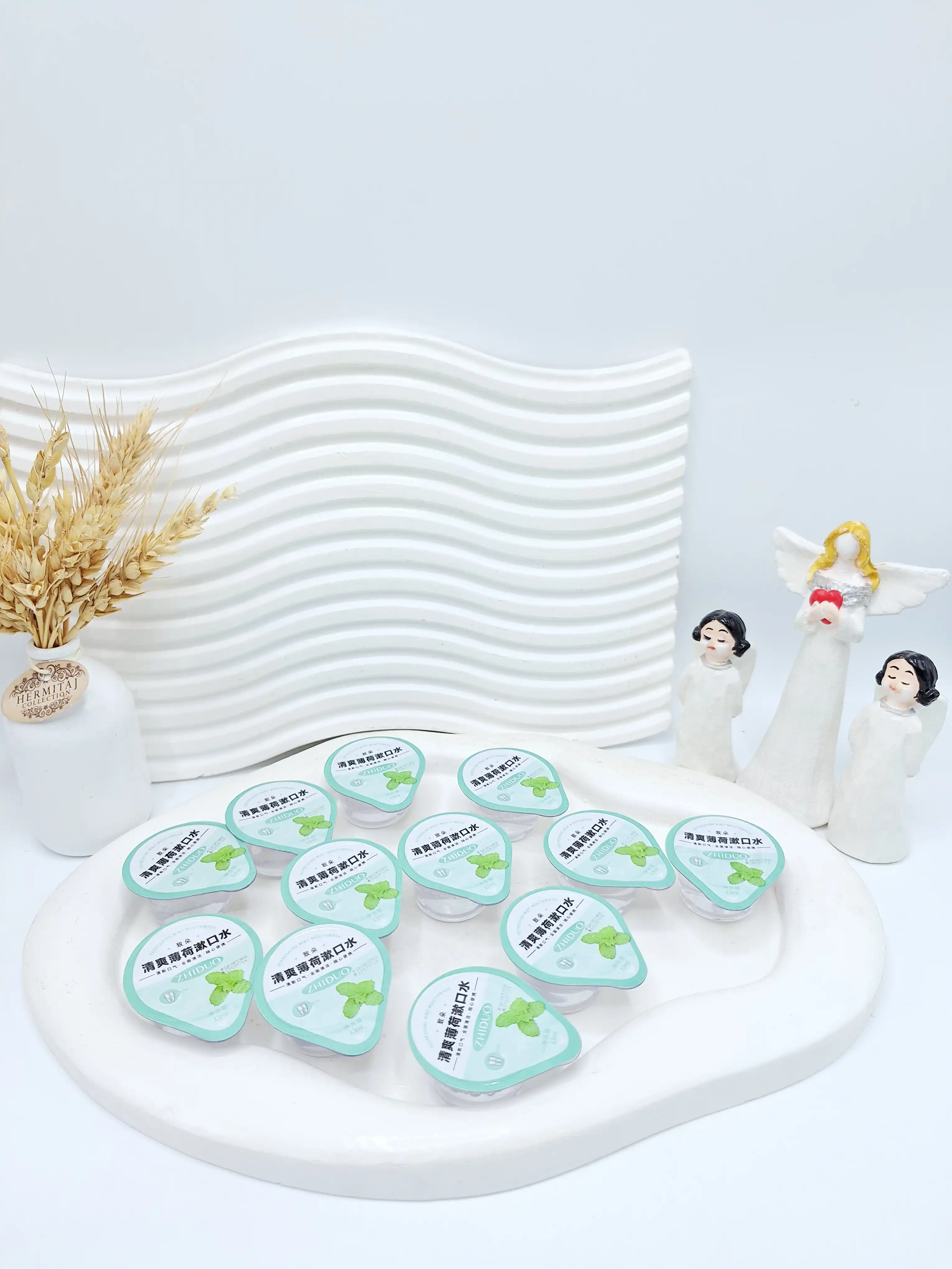 پک 12 تایی دهانشویه طراوت بخش نعنا ZHIDUO کد 3435