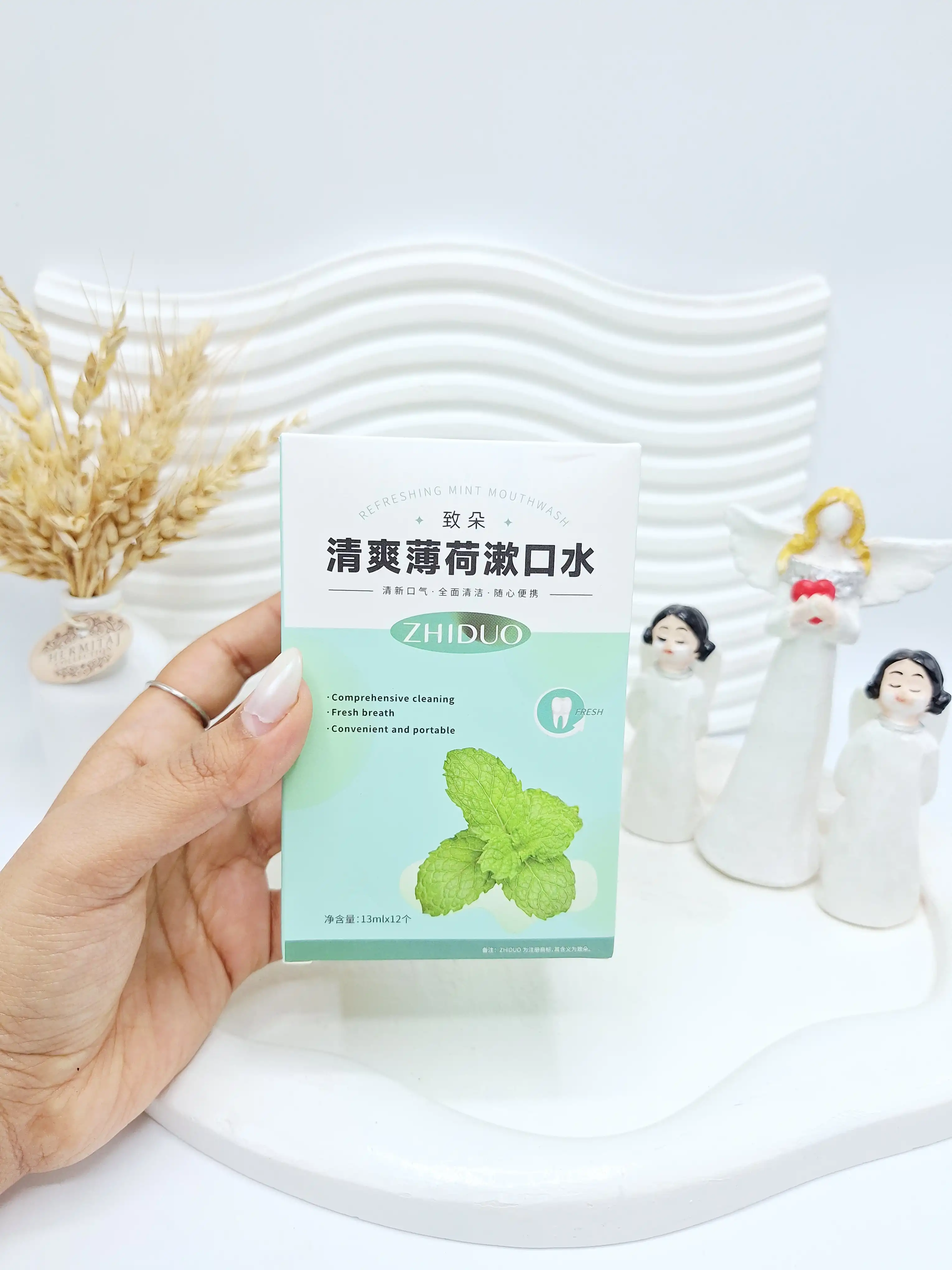 پک 12 تایی دهانشویه طراوت بخش نعنا ZHIDUO کد 3435